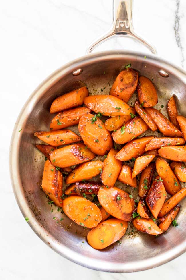 These lemon-honey glazed carrots are fast and easy. A great side dish! | girlgonegourmet.com