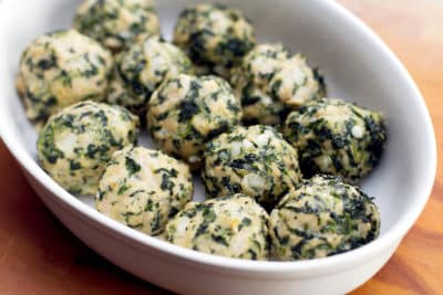 chicken and spinach meatballs in a serving bowl