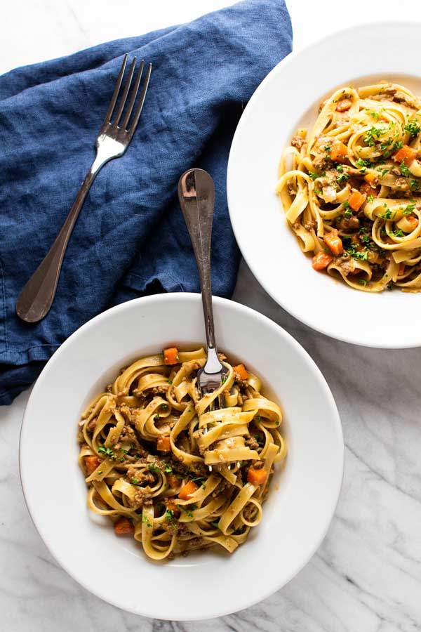 two bowls of bolognese