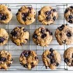 overhead photo of blueberry buttermilk muffins on a baking rack