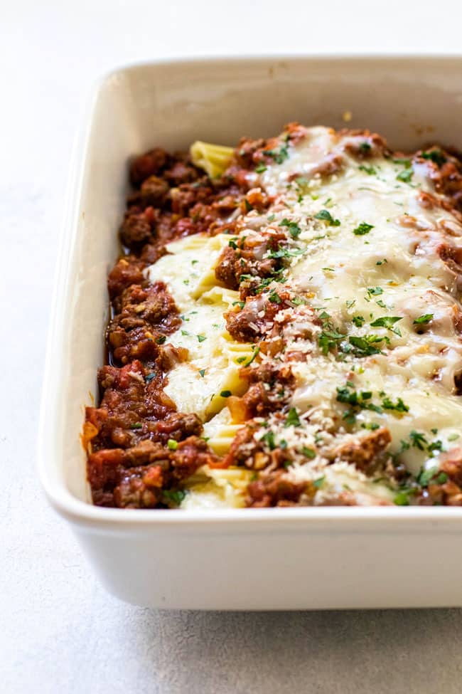 Four-Cheese Manicotti with Meat Sauce in a baking dish
