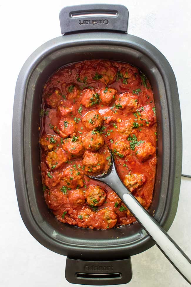 meatballs in a slow cooker with homemade sauce