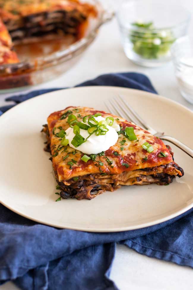 photo of a slice of taco pie on a plate