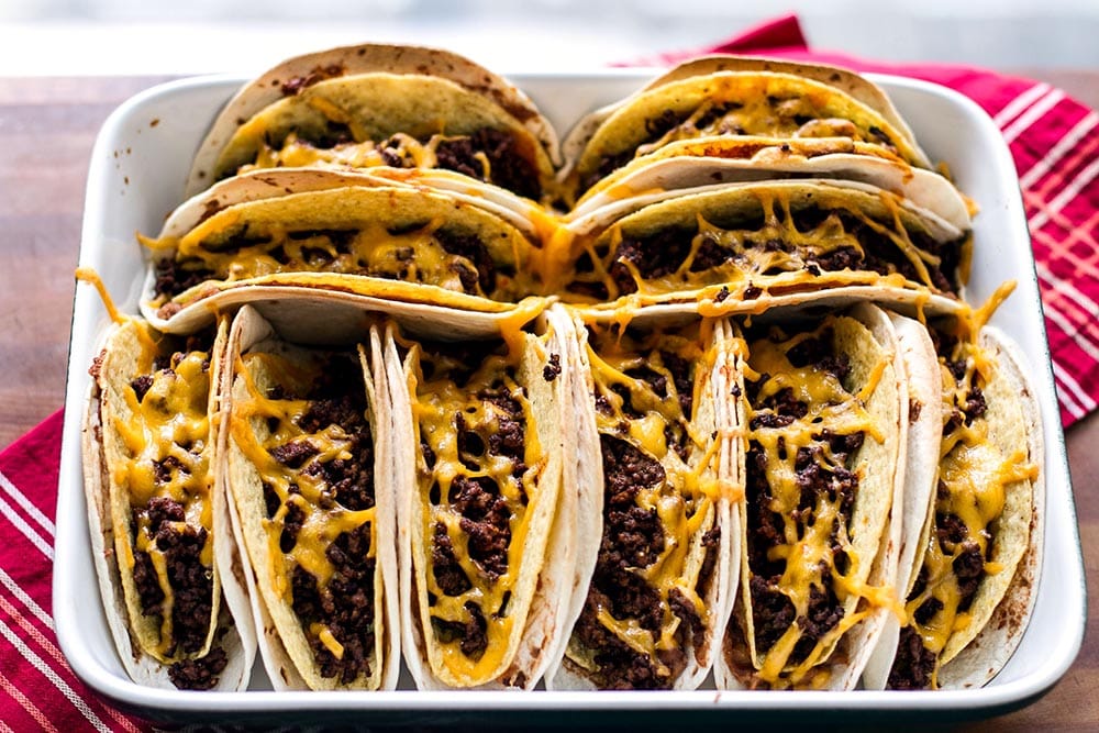 Baked double decker tacos in a baking dish