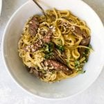 carbonara with sirloin steak in a bowl