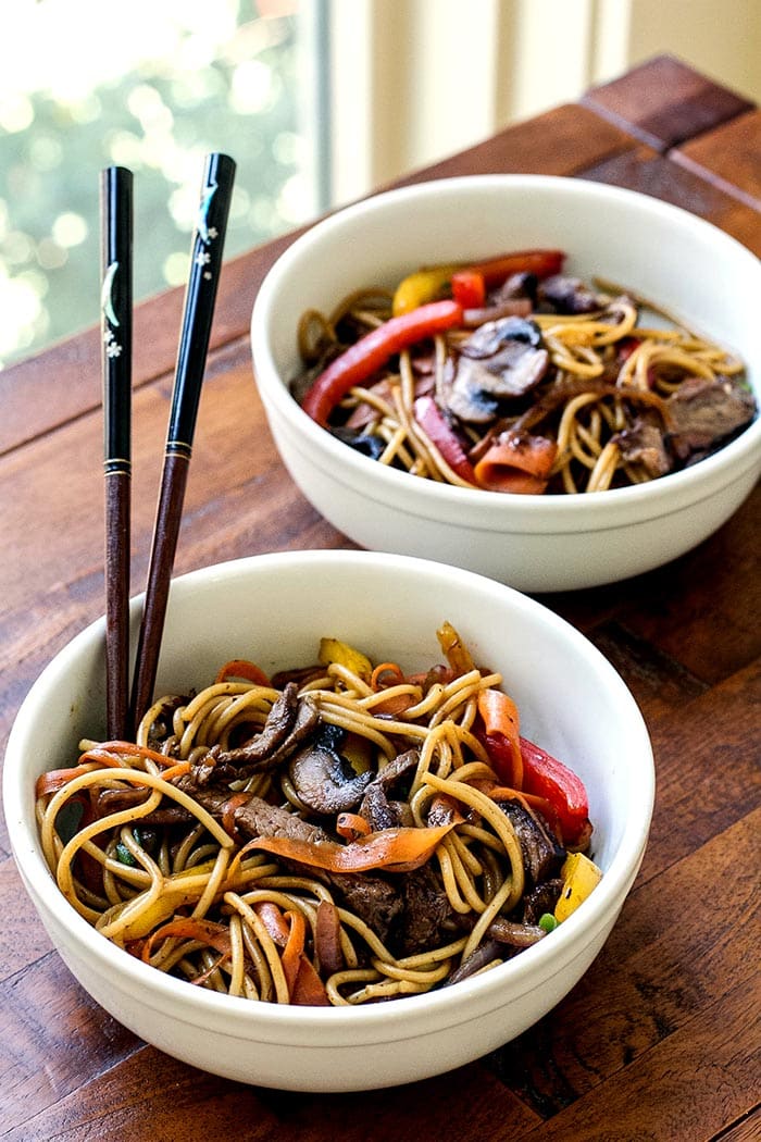 two beef and noodle bowls.