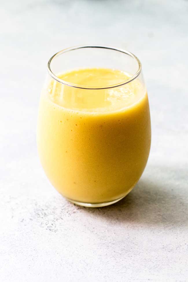 A glass of pineapple smoothie