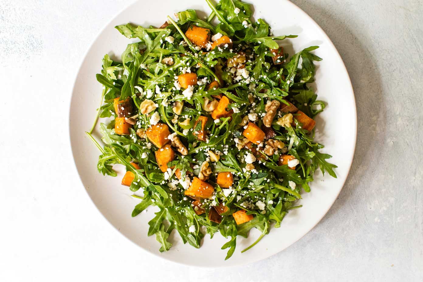 roasted sweet potato and arugula salad