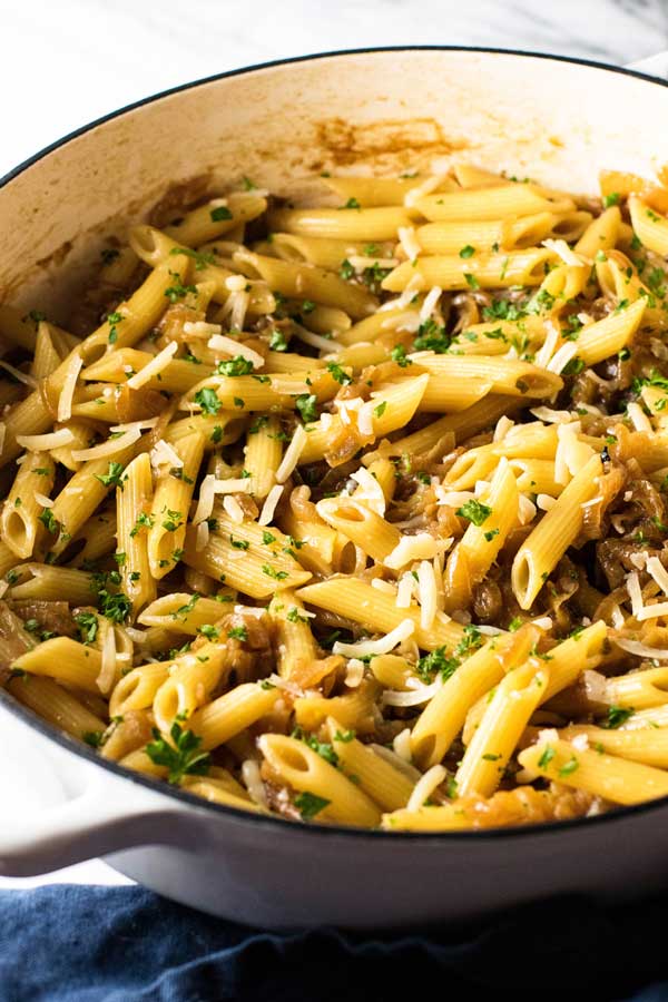 caramelized onion pasta in a white skillet