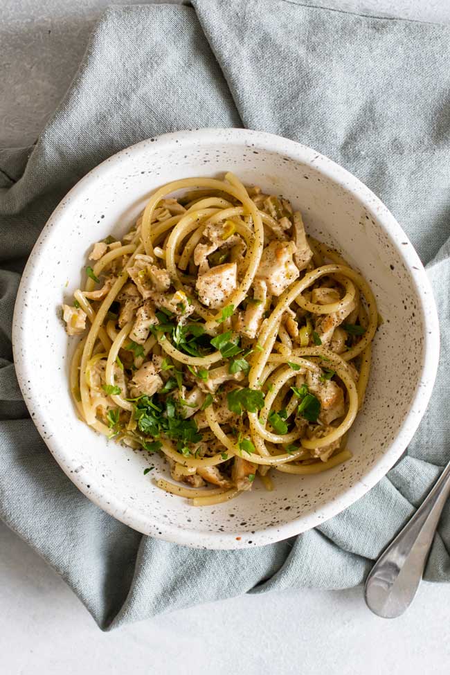 overhead photo of a bowl of lemon leek pasta with chicken