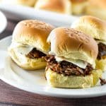 Use your slow cooker to make a big batch of tender short ribs - pile it high on rolls for a great game day snack! | girlgonegourmet.com