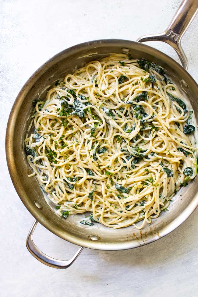 creamy goat cheese spaghetti in a large skillet