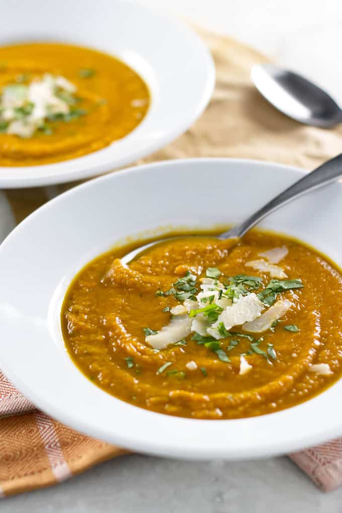 close-up photo of a bowl of carrot soup