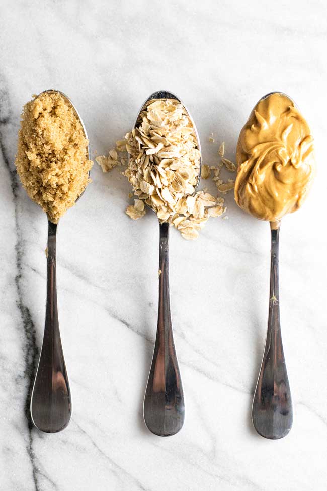 photo of three spoons with ingredients for the bars