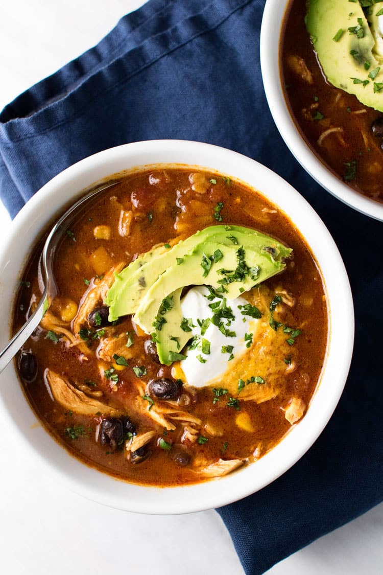 overhead photo of a bowl of chicken tortilla soup