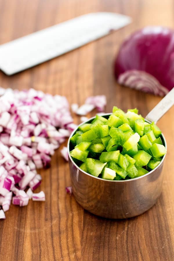 Ingredients for black bean chili: chopped onion and green pepper