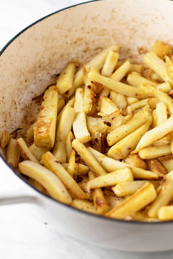 photo of roasted parsnips in a pan