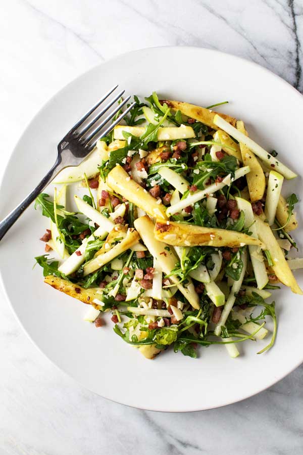 overhead photo of a plate of roasted parsnip salad