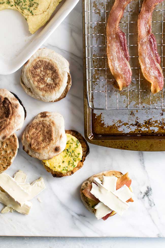 overhead photo of breakfast sandwiches being assembled