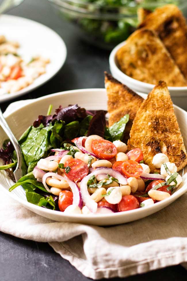 White Bean Tomato Salad with Toasted Bread in a bowl