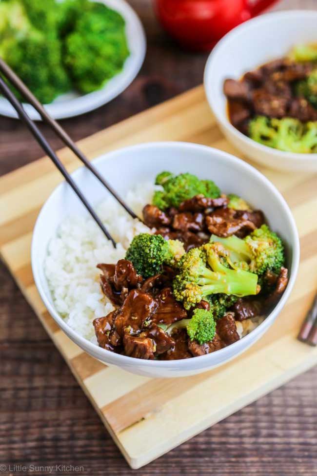 Beef and Broccoli with a bowl with rice