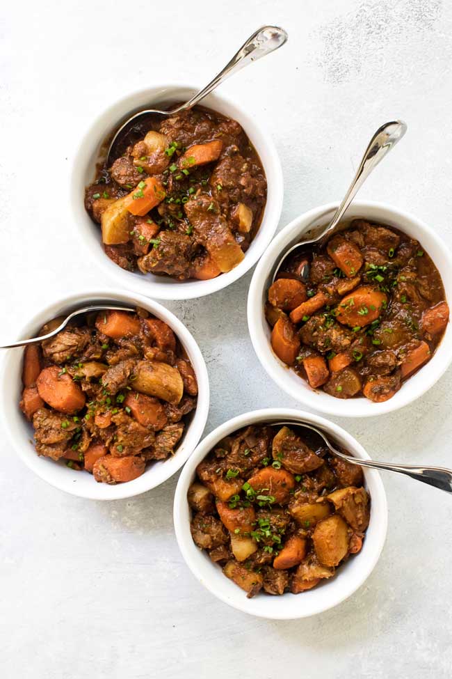 four bowls of slow cooker beef stew