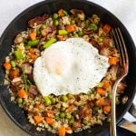 bacon fried rice in a black skillet