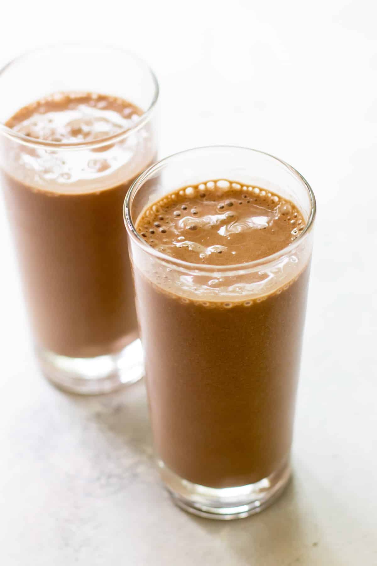 two glasses of banana mocha smoothie.
