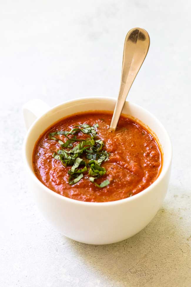 tomato basil soup for one in a white mug