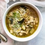 overhead photo of one bowl of pesto chicken orzo soup