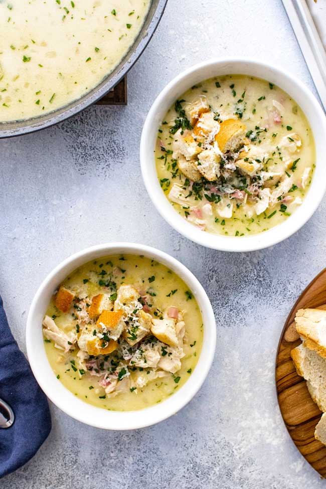 overhead photo of two bowls of chicken cordon bleu soup