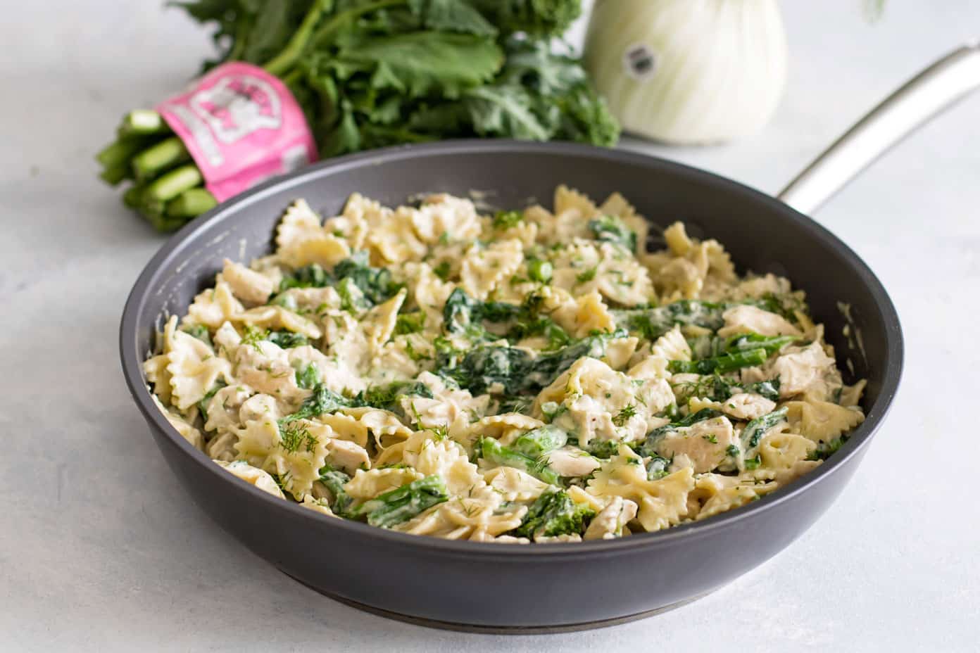 photo of a skillet of broccoli rabe chicken pasta