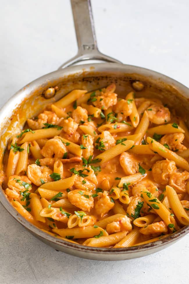 photo of a skillet of shrimp penne with vodka sauce