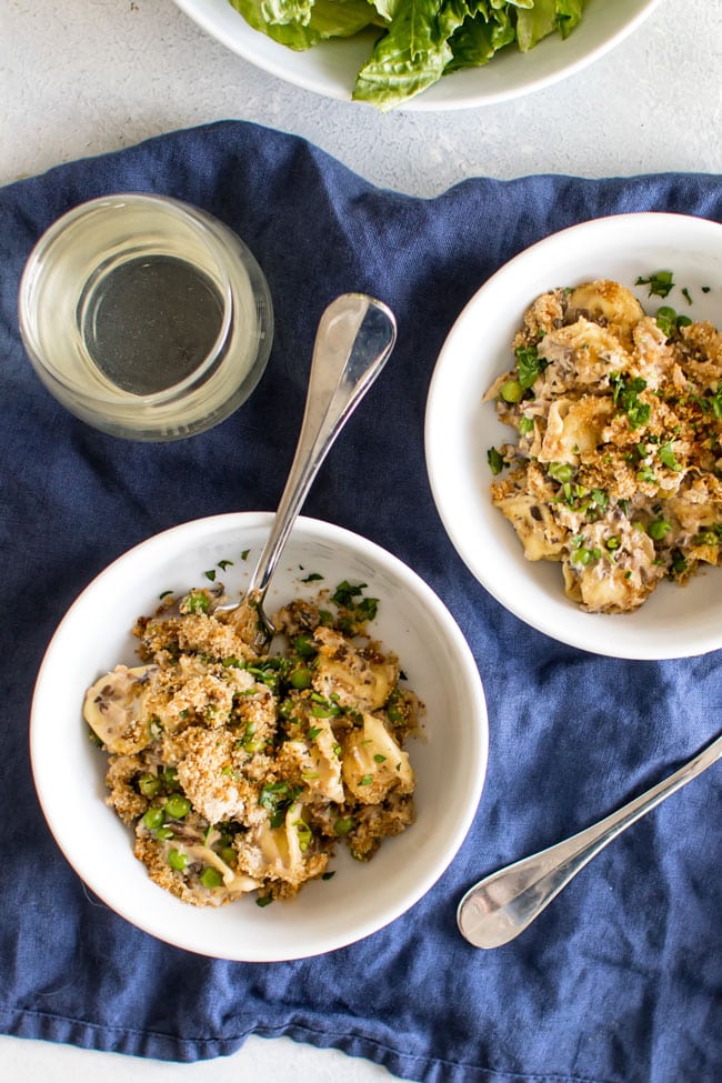 Overhead photo of two bowls of tortellini tuna casserole