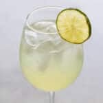 a spritzer in a glass.