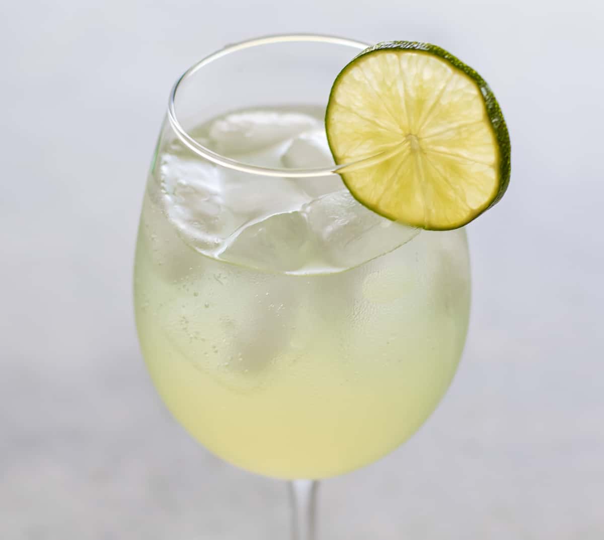 a spritzer in a glass.