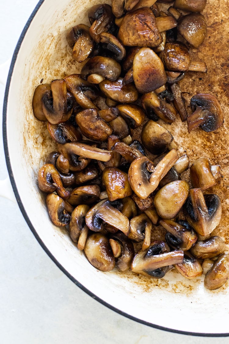 overhead photo of browned mushrooms in a pan