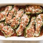 photo of stuffed peppers in a baking dish