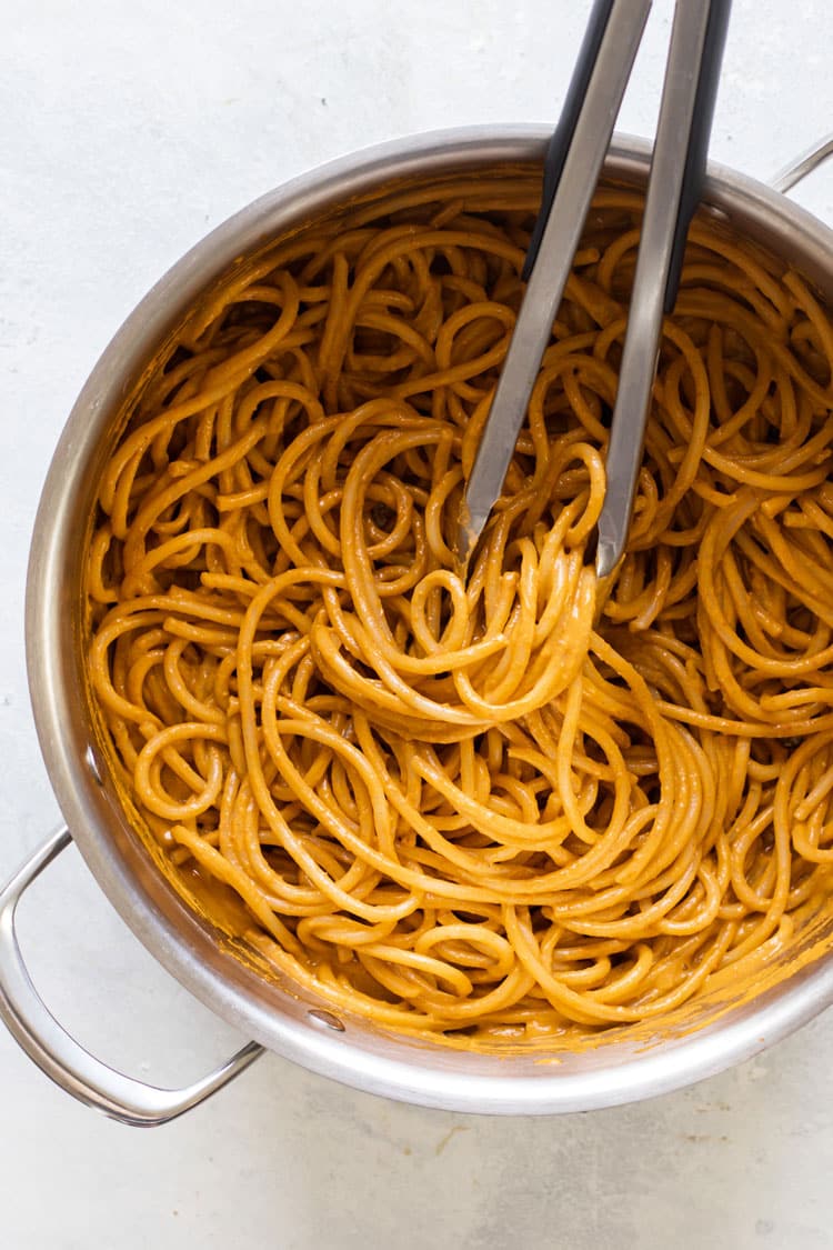 overhead photo of a pot of tomato pasta