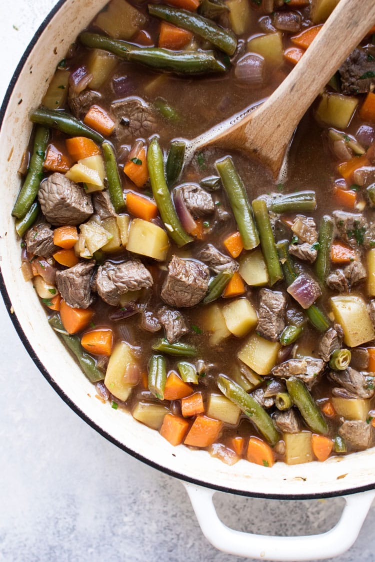 overhead photo of the soup simmering in a pot