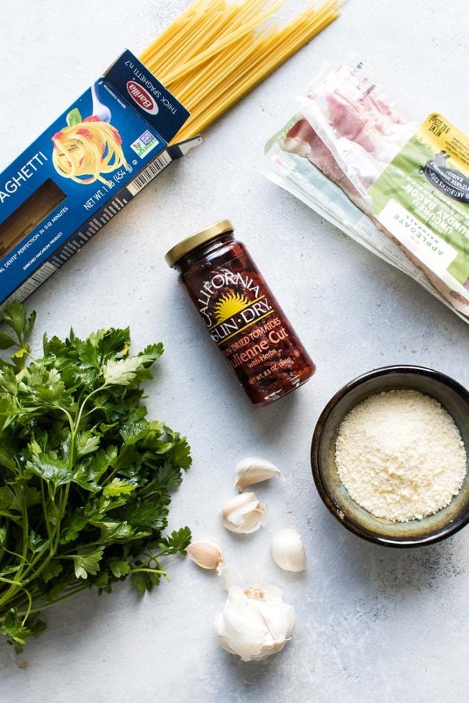 overhead photo of the ingredients for sun-dried tomato pasta