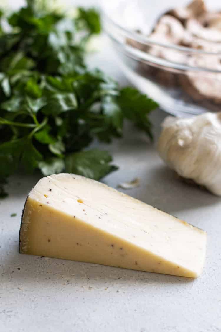 photo of a wedge of truffle cheese