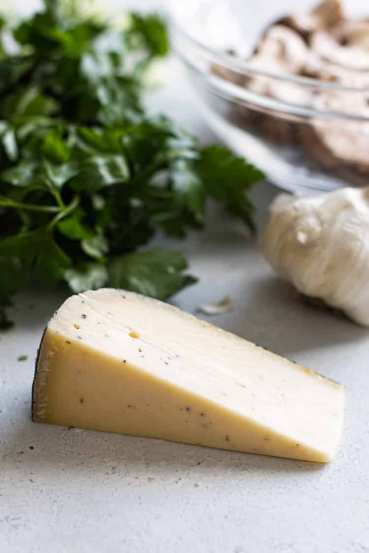 photo of a wedge of truffle cheese