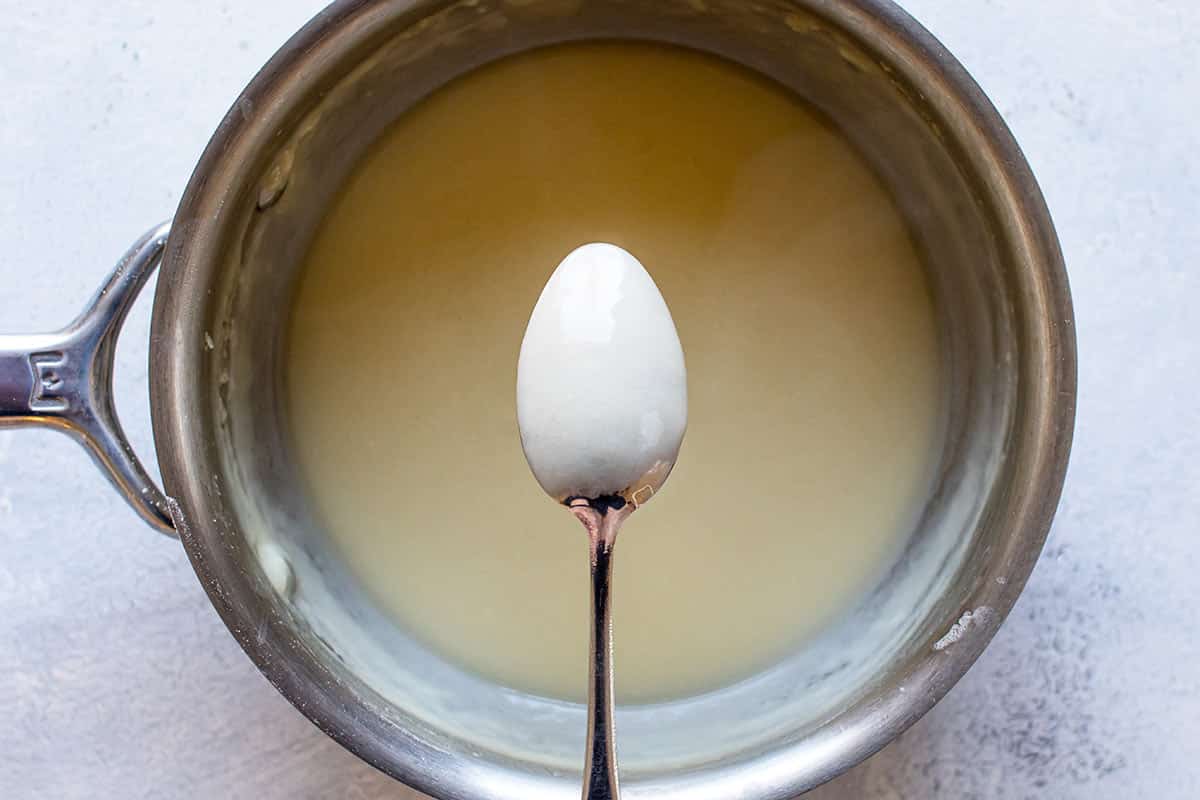 photo of the back of a spoon coated with sauce