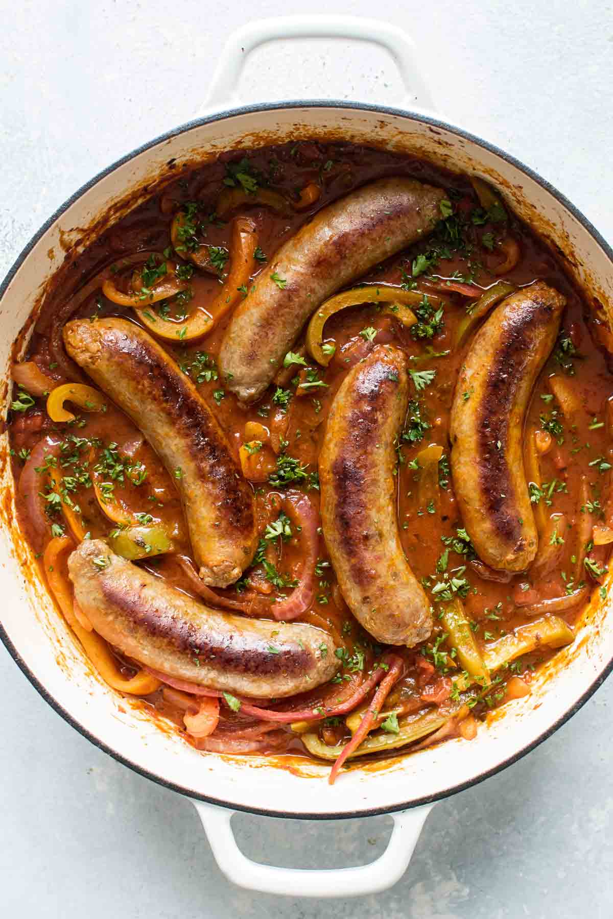 overhead photo of a pan of sausage and peppers