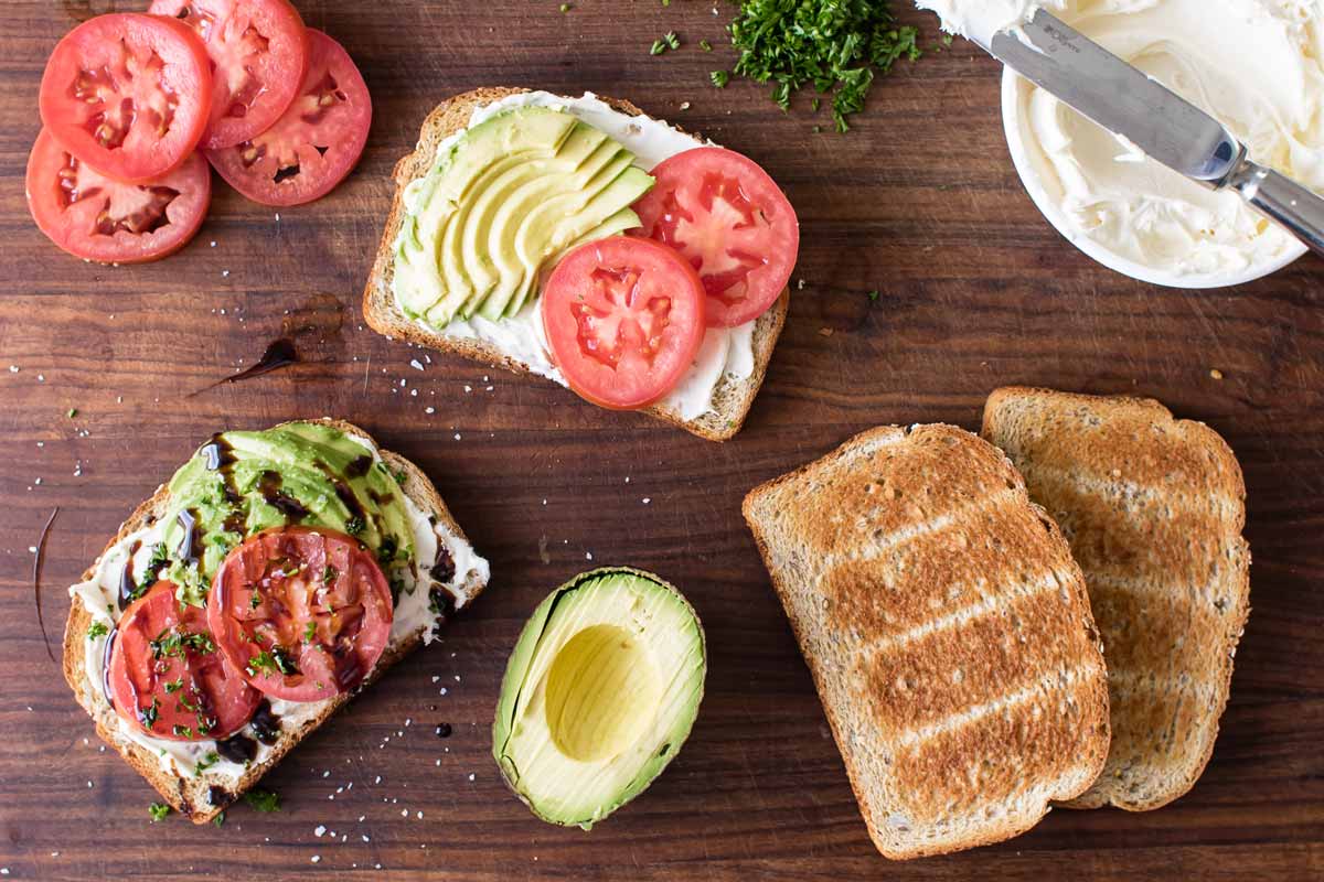 photo showing the avocado toast being assembled