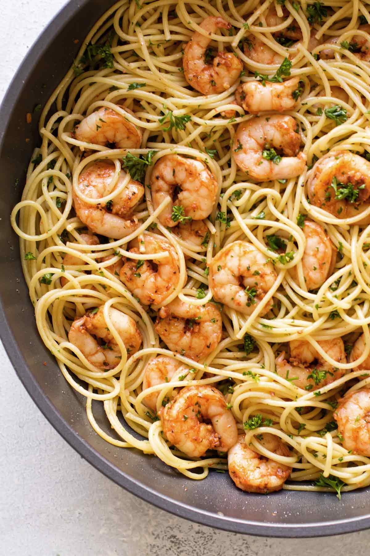 overhead photo of shrimp pasta in a pan