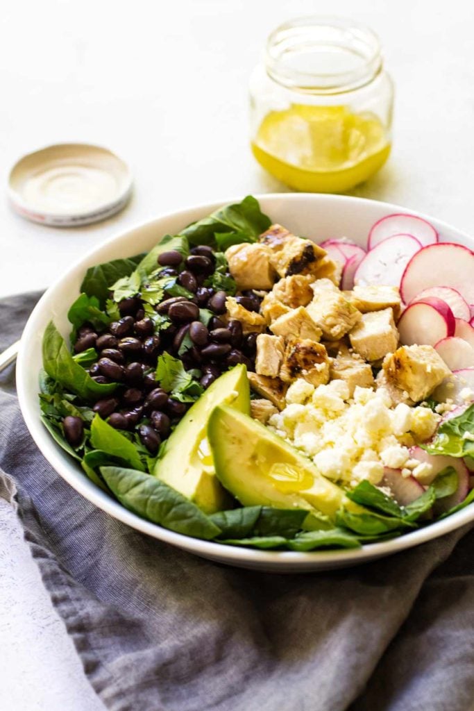 close-up photo of chicken spinach salad