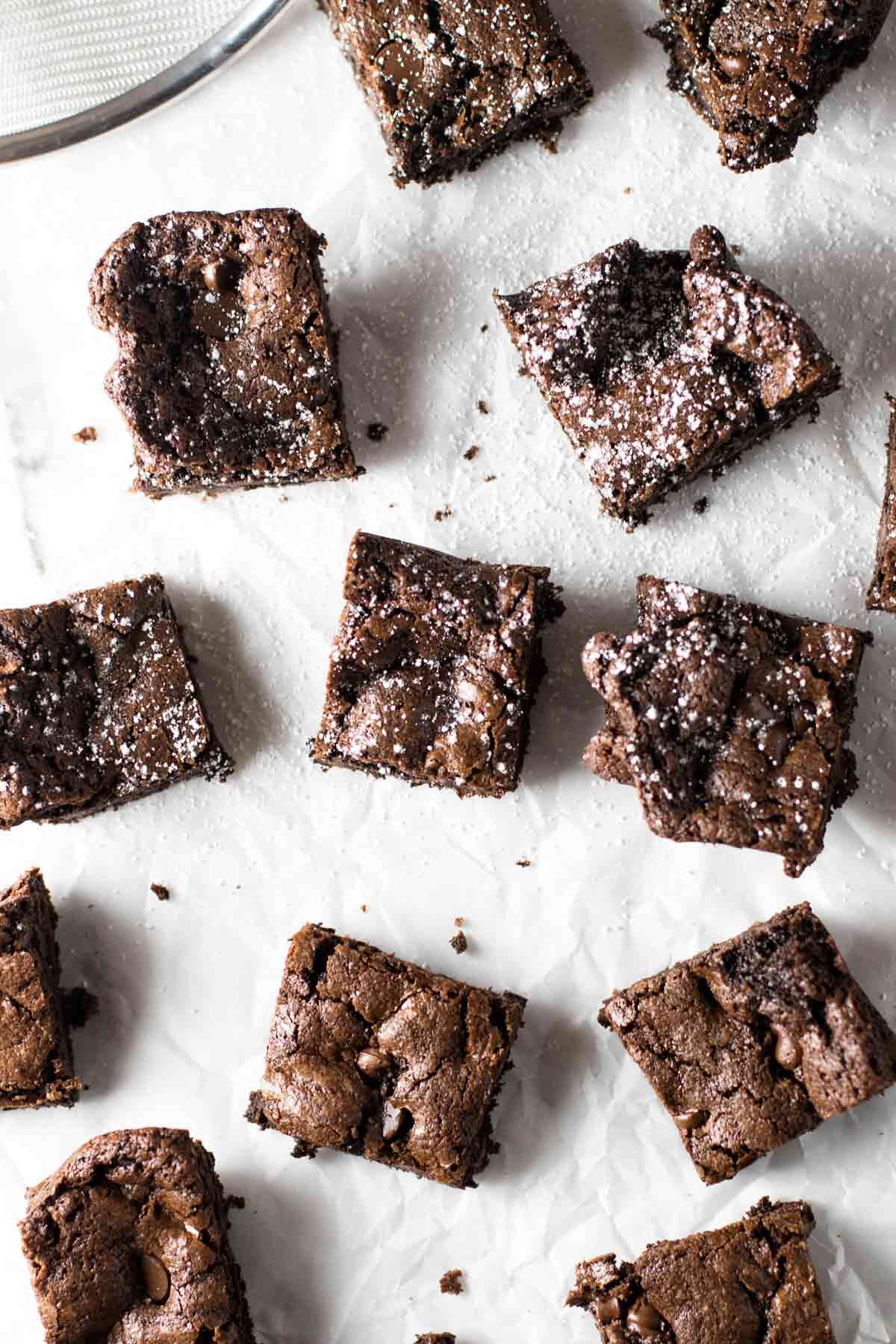 overhead photo of brownies dusted with powdered sugar