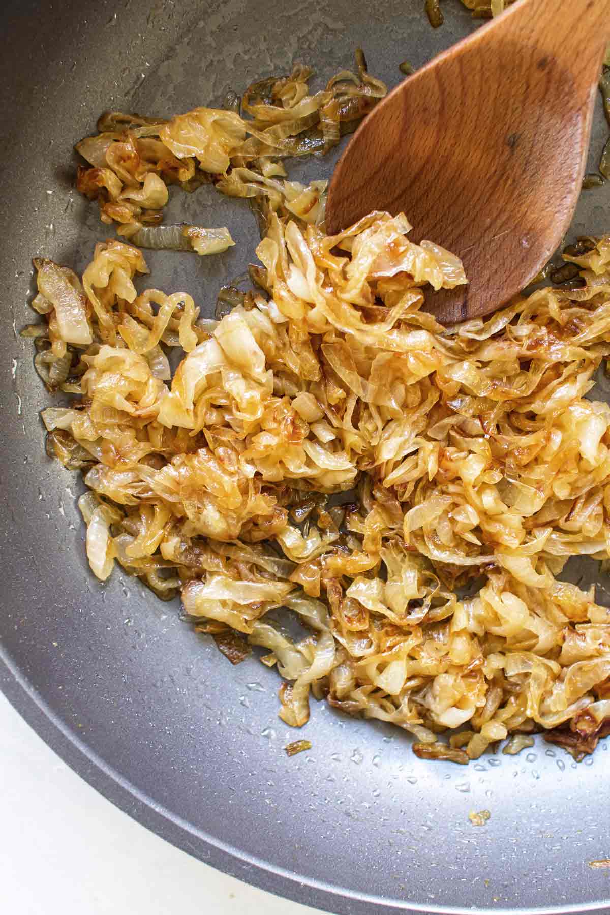 overhead photo of caramelized onions in a pan